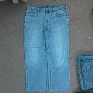 Tommy bahama custom jeans 
Cut at the bottom